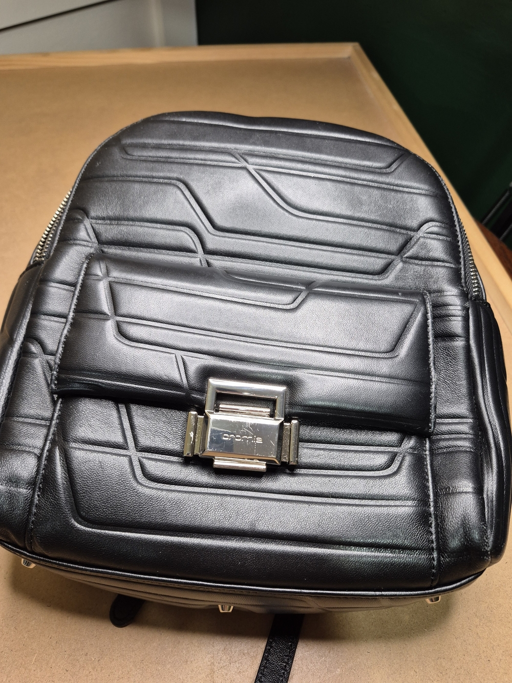 Black Quilted Leather Backpack with Polished Metal Clasp